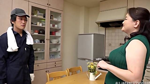 Japanese mature gets intimate with younger man's pecker