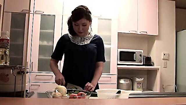 Asian amateur granny toys her cunt