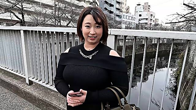 Japanese AV Model flaunting big boobs