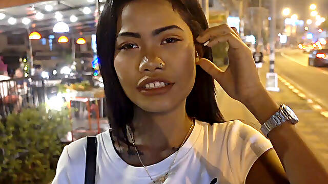Cute Thai teen with tattoos fucks a Farang on amateur sex video