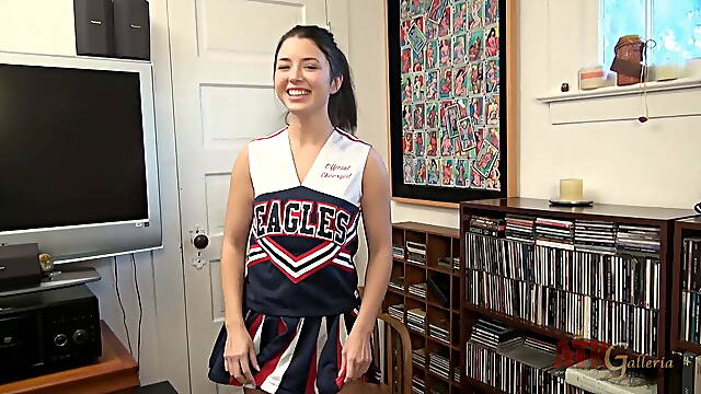 Petite brunette cheerleader Daisy Haze plays in her pussy with her vibrator until she cums