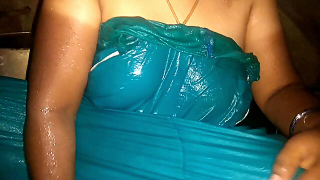 Tamil aunty bathing in village