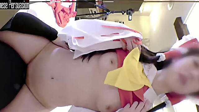Slender Downer Style Cosplayer Shows Her Quiet Charm While Playing a Reimu Shrine Maiden Role Angle1